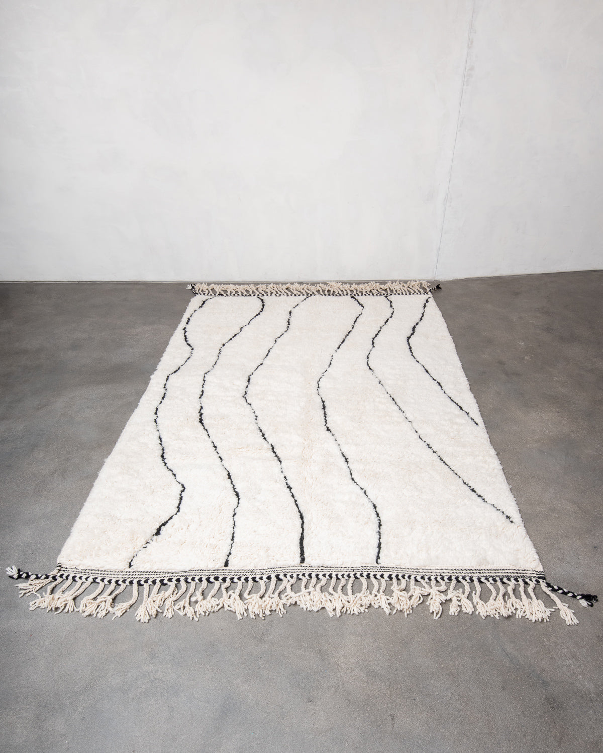 Modern, designer, handcrafted Berber rug from Morocco. Beniourain carpet with beautiful colours and patterns and fluffy wool texture.
